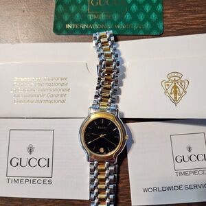 Gucci Gold and Silver Watch with Black Face